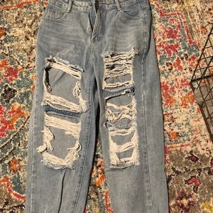 Ripped jeans worn x1